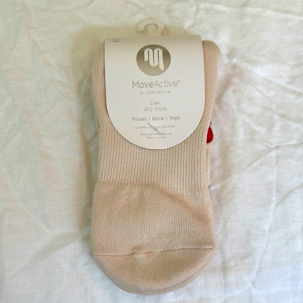 NWT MoveActive grip socks. Cream with cute heart detail. Size small.